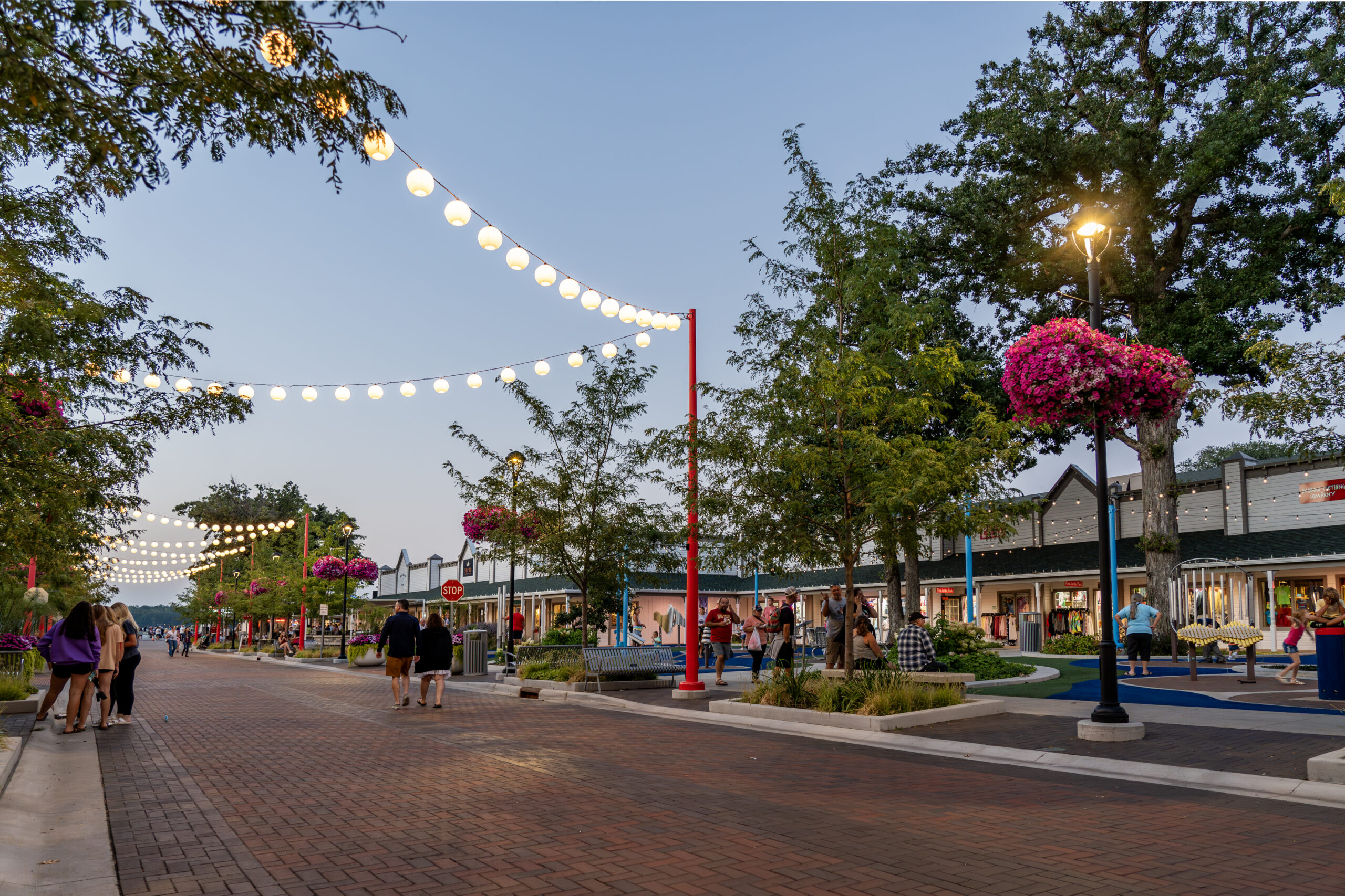 Aerial view of Lake Street in Arnolds Park, Iowa, featuring reconstructed streetscape, brick paving, landscaping, and pedestrian areas.